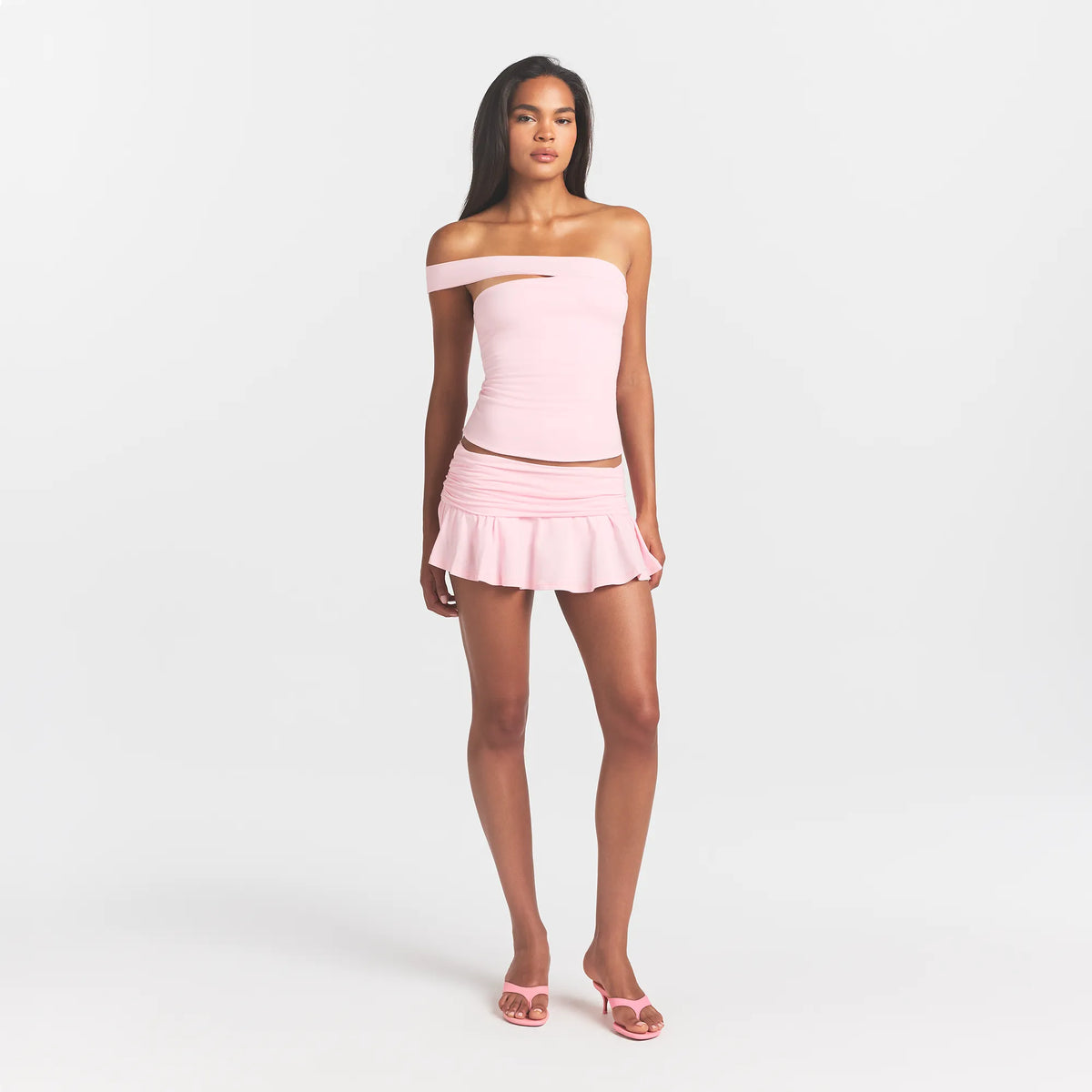 COTTON JERSEY ASYMMETRICAL TOP | CHERRY BLOSSOM ON A MODEL FRONT VIEW @ | FOCUS: 0.0, 1.0, 0.9