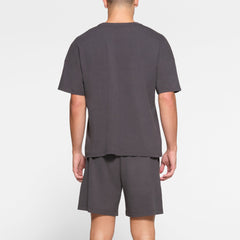 LOUNGE JERSEY MENS RELAXED T-SHIRT | ASH ON A MODEL BACK VIEW