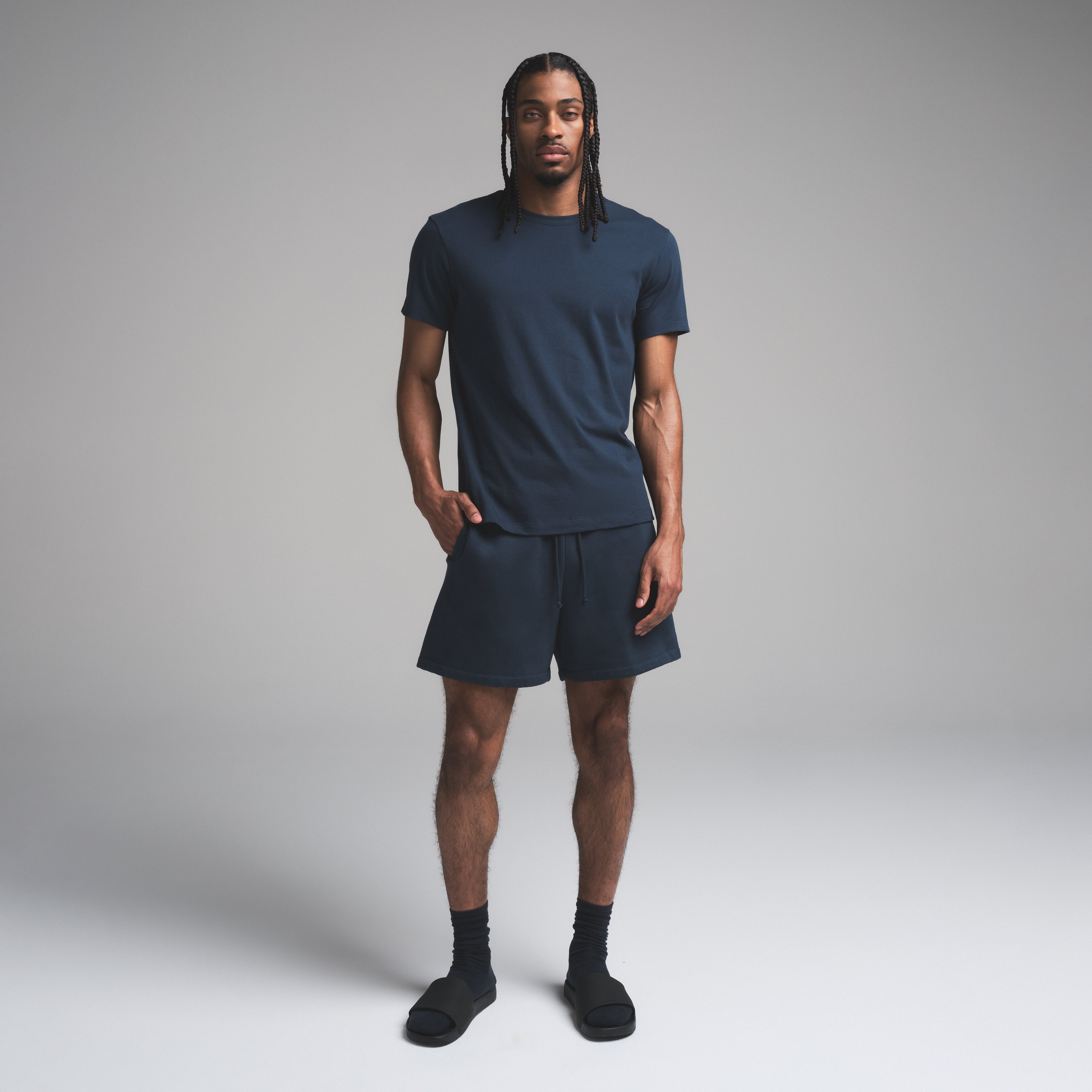 SKIMS COTTON MENS CLASSIC T-SHIRT | NAVY ON A MODEL FRONT VIEW | FOCUS: 0.0, 1.0, 0.9