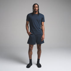 SKIMS COTTON MENS CLASSIC T-SHIRT | NAVY ON A MODEL FRONT VIEW | FOCUS: 0.0, 1.0, 0.9