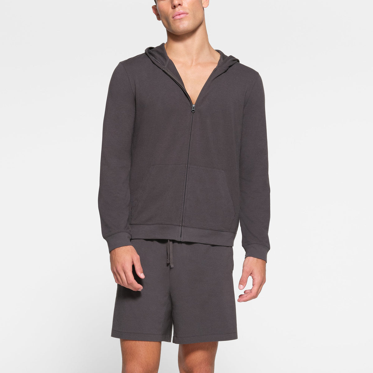 LOUNGE JERSEY MENS ZIP UP HOODIE | ASH ON A MODEL FRONT VIEW
